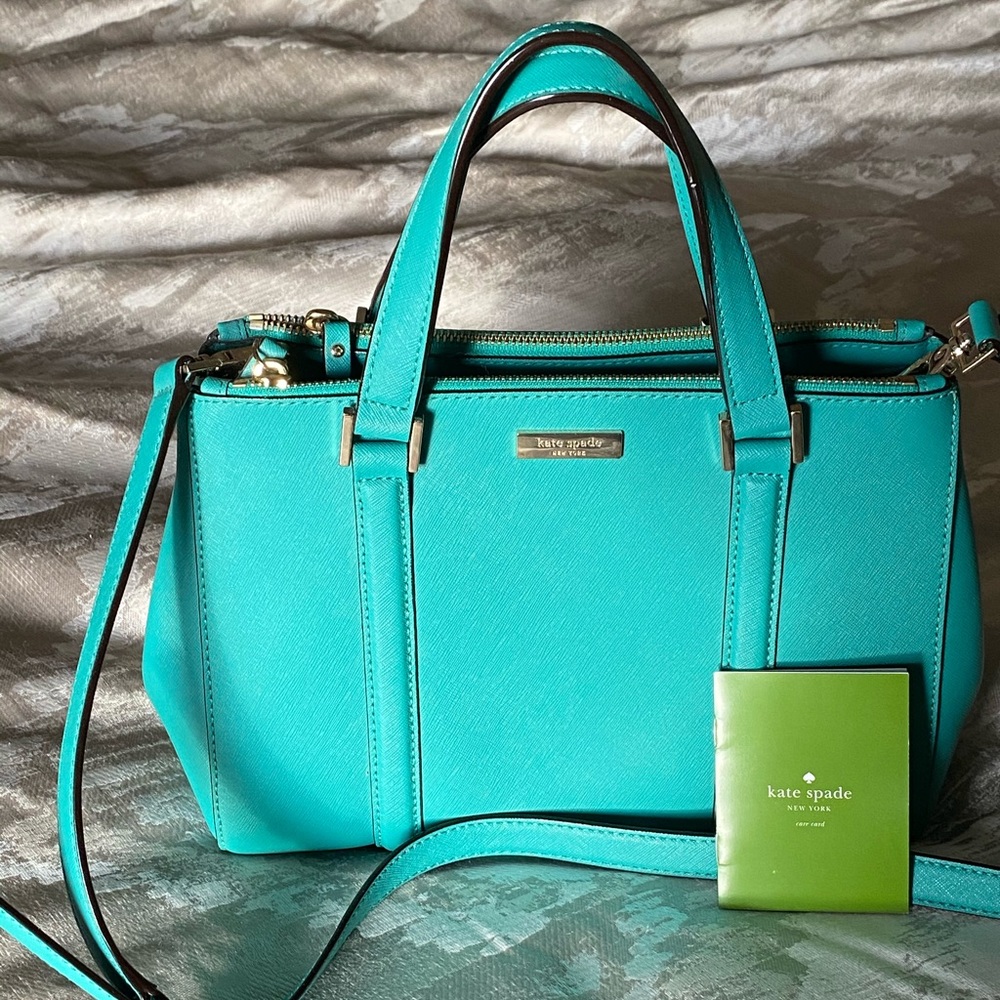 Kate Spade satchel bag in bluish green.